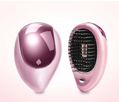 Portable vibrating hair massage comb with ionic technology for on-the-go hair rejuvenation and styling