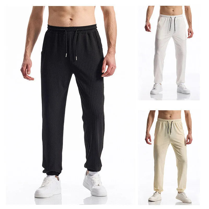 Silky rib fabric baggy straight trousers with drawstring waistband in black, white or khaki colours