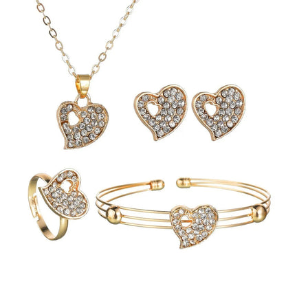 Gold-coloured women's love jewellery set with earrings, pendant and bracelet featuring bell patterns