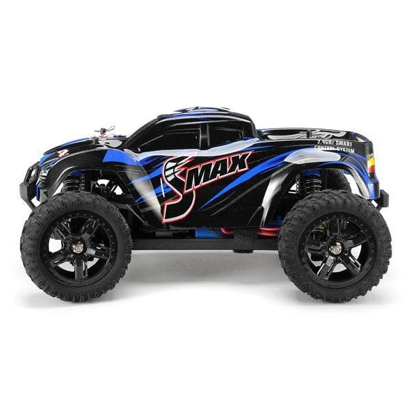 Blue REMO 1631 1:16 scale 4WD RC truck with transmitter on rough terrain