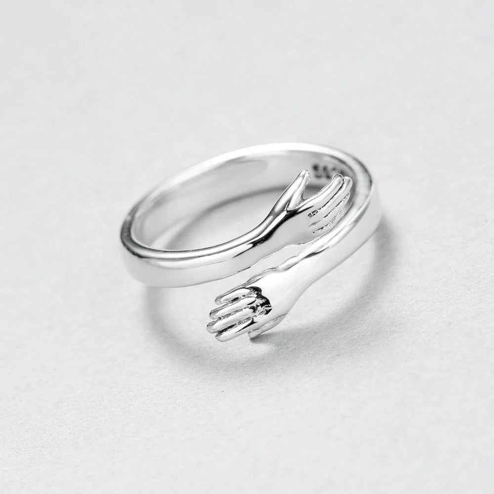 Sleek adjustable couple's ring made of premium brass and stainless steel, symbolizing the eternal embrace of love