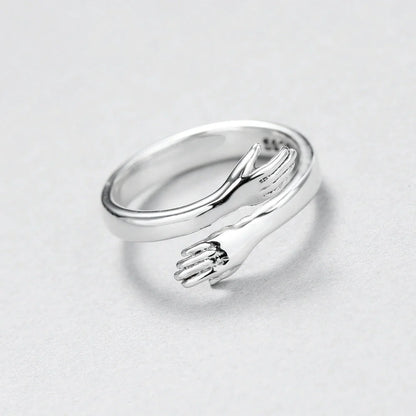Sleek adjustable couple's ring made of premium brass and stainless steel, symbolizing the eternal embrace of love