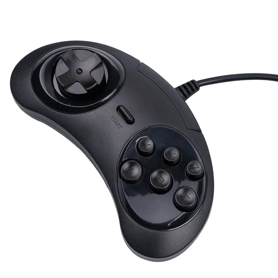 Black Sega-style USB game controller for PC with a long braided cable on a desk
