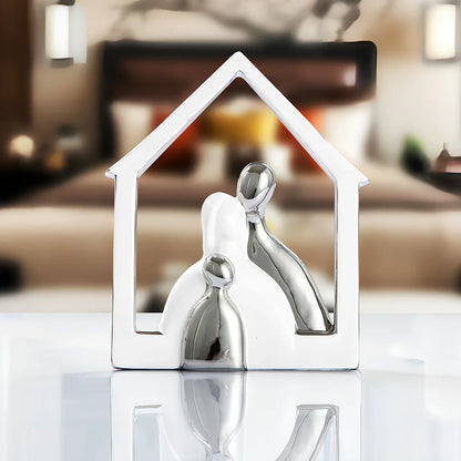 Ceramic photo frame with electroplated finish displaying character design elements