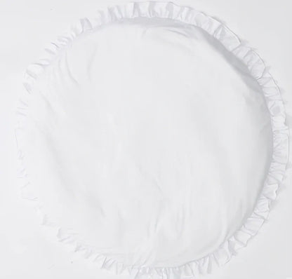 Circular baby play mat with lace border showing 2cm thickness measurement