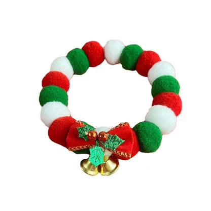 Festive plush pet collar with bow for dogs and cats, perfect for Christmas
