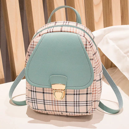 Black diagonal crossbody phone bag with adjustable strap and magnetic flap, shown on a model.