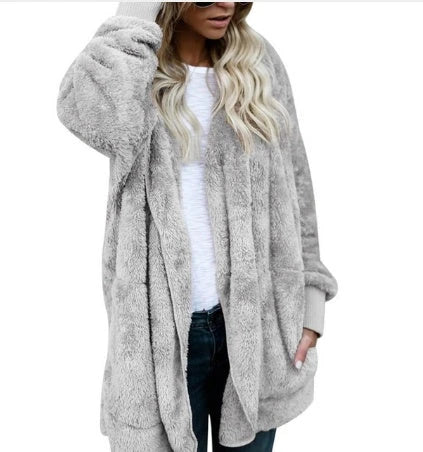 A cozy, plush women's jacket in a variety of colors with a relaxed, oversized fit for easy layering
