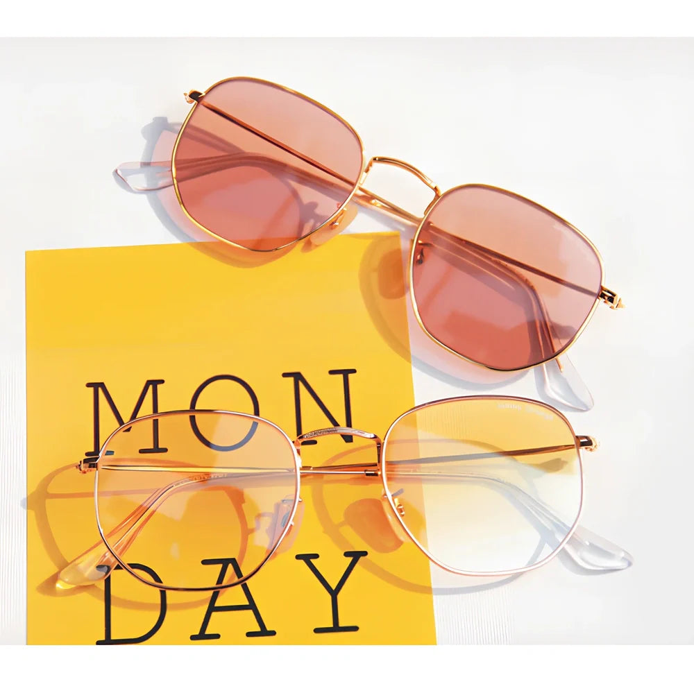 Retro street sunglasses with metal frame and transparent coloured lenses offering UV400 protection