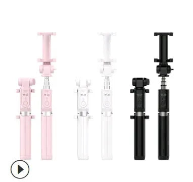 Black aluminium Bluetooth selfie stick with tripod legs extended, holding a mobile phone.