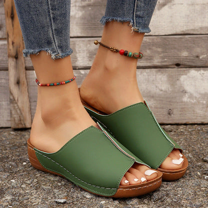 Trendy wedge sandals for women in various colors, featuring a unique European-inspired design, cushioned footbed, and non-slip sole for comfort and style.