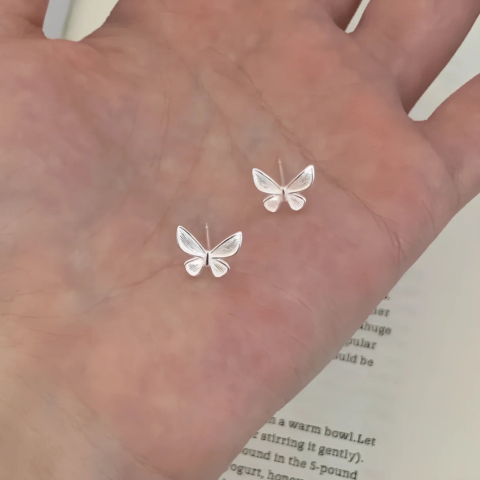 Sweet tridimensional butterfly stud earrings with textured design and electroplated finish