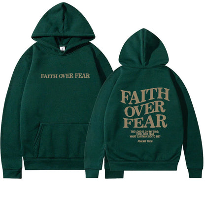 A stylish Christian hoodie with inspirational graphics and a message of faith over fear