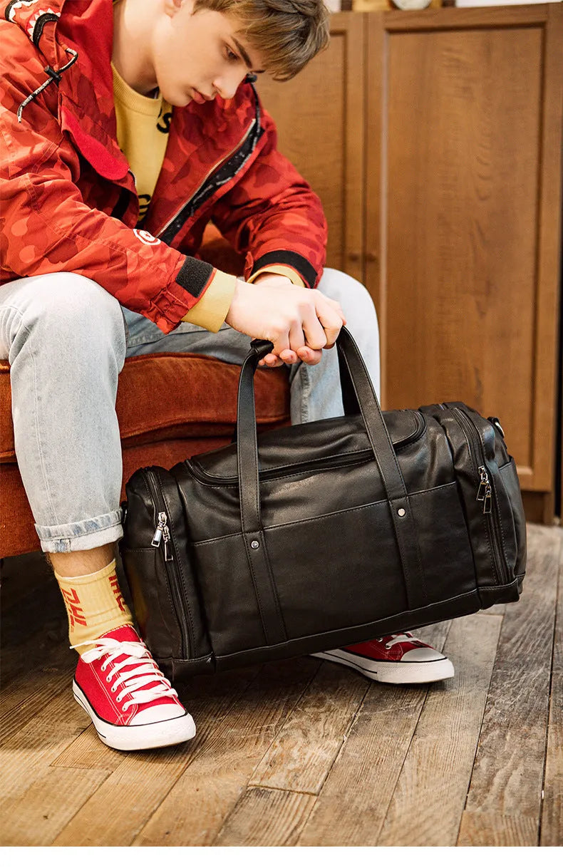 Black PU men's travel bag, 50cm wide and 26cm high, with phone, cigarette, and hidden zipper bags