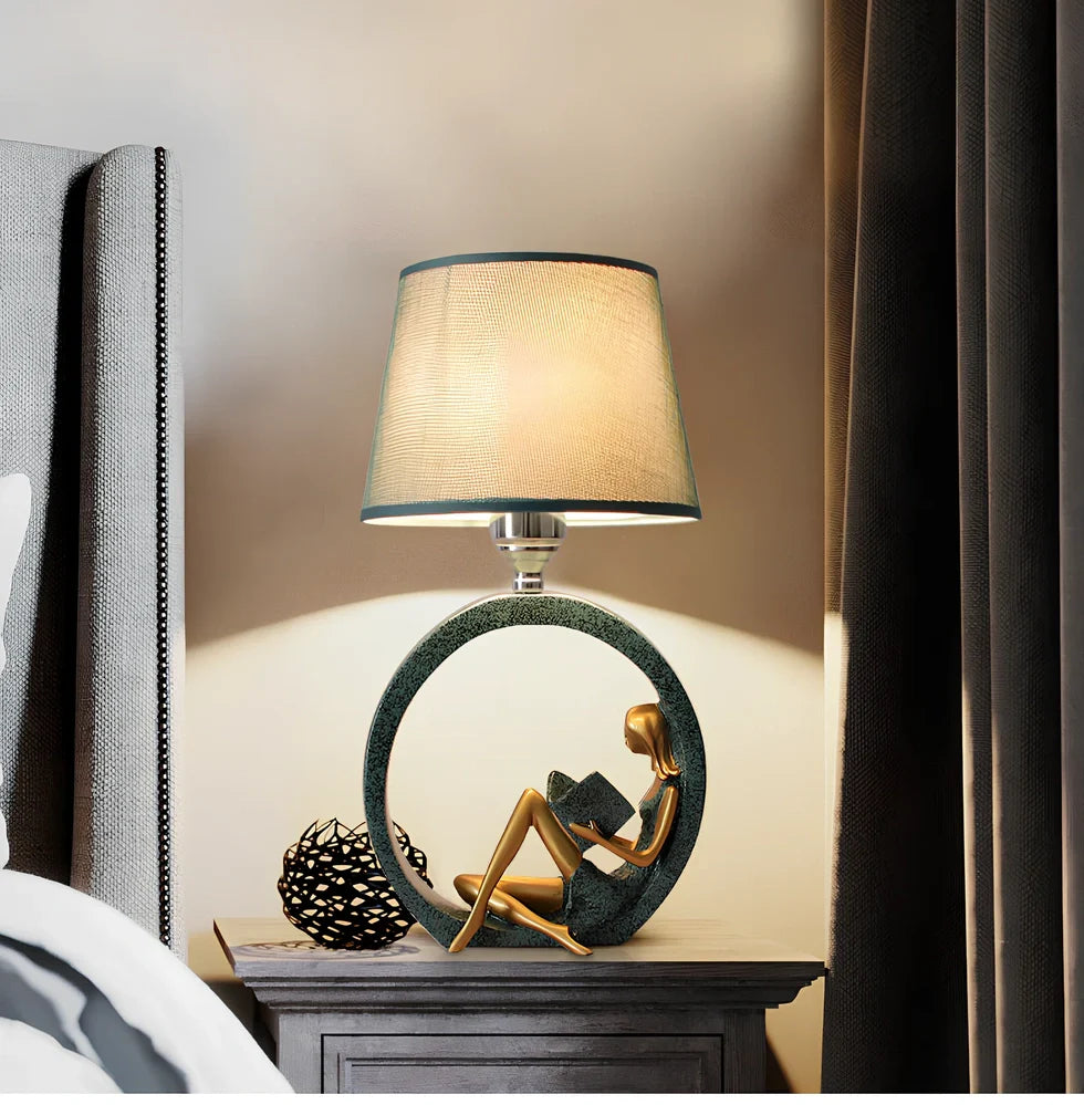 Blue reading night light with resin base and cloth shade measuring 20x39.8cm