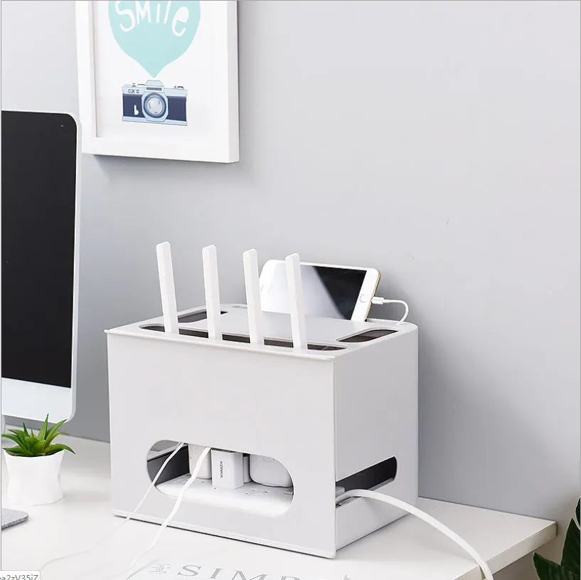 Grey and white plastic wireless router storage box with cable management compartment