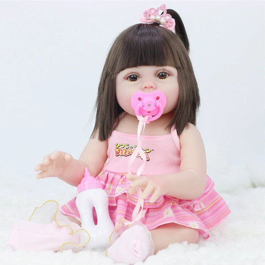 Interactive baby doll with drinking bottle showing 46cm length and 360-degree rotating limbs