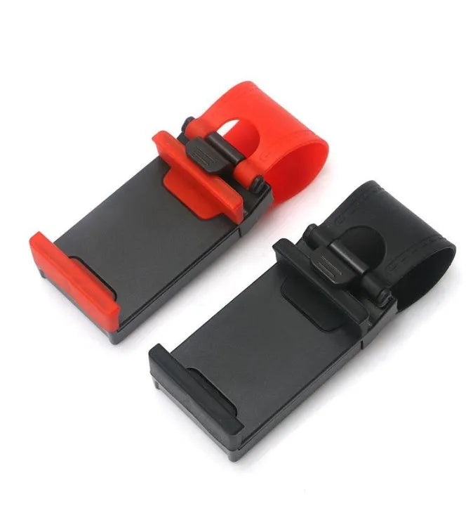Black steering wheel phone holder with 75mm clip mounted on car wheel holding smartphone