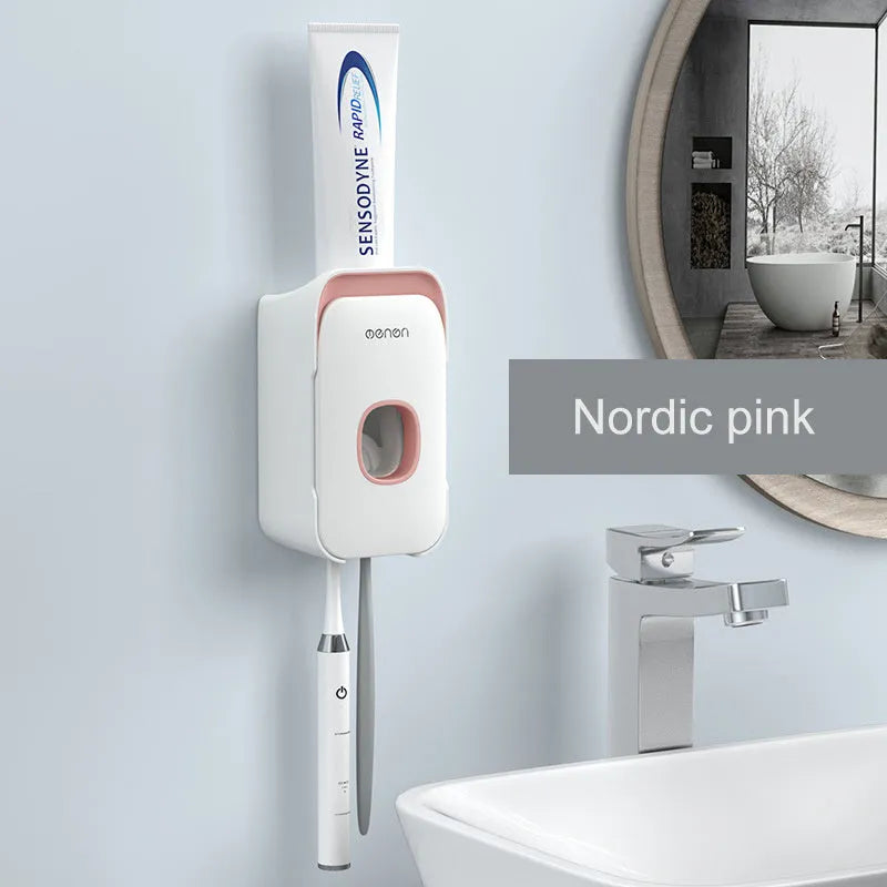 Automatic toothpaste dispenser with motion sensor and LED light in blue, grey or pink colours mounted on bathroom wall