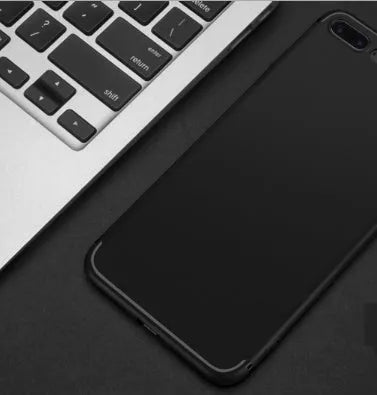 A flexible TPU silicone case for an iPhone, shown in a choice of black, blue, red, or white.