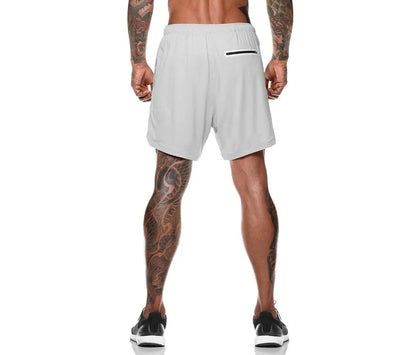 Pocket compression shorts in nylon, moisture-wicking and quick-drying, available in multiple colours and sizes S to 3XL.