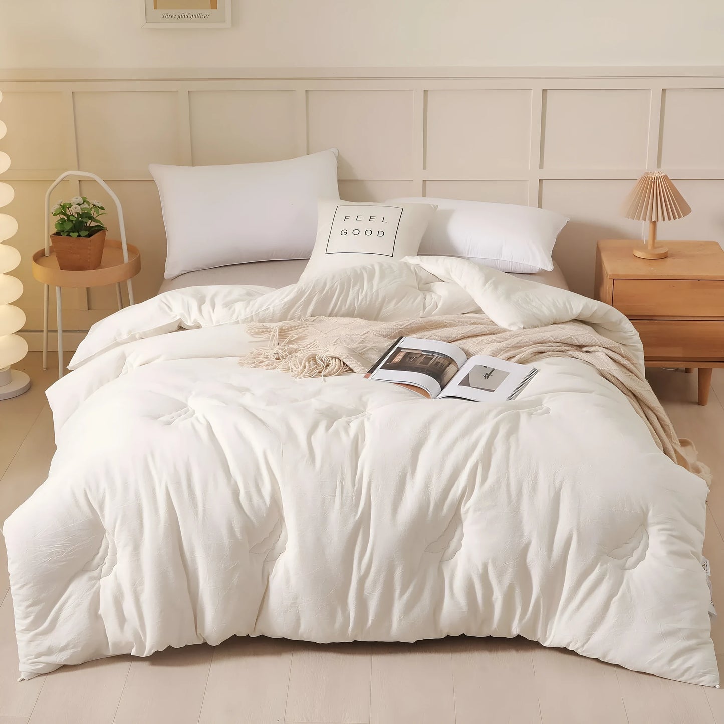 A pure cotton soybean fibre quilt in grey, showing its twill weave texture, laid flat on a bed.