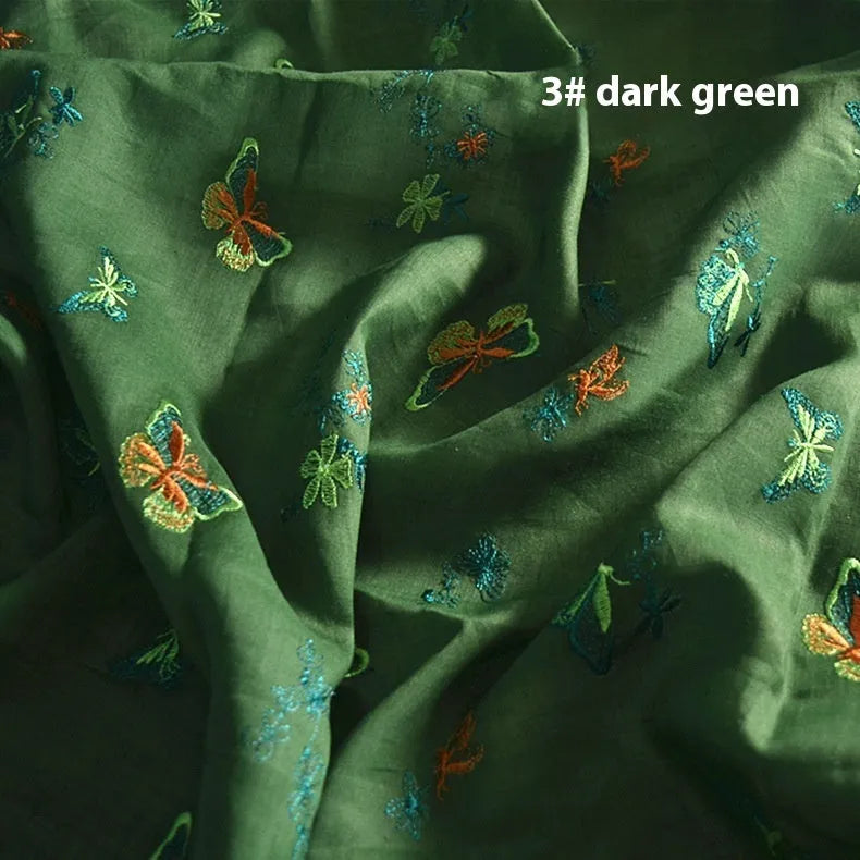 Pure ramie embroidery cloth hanfu fabric in beige, grass green, and dark green colours showing natural texture