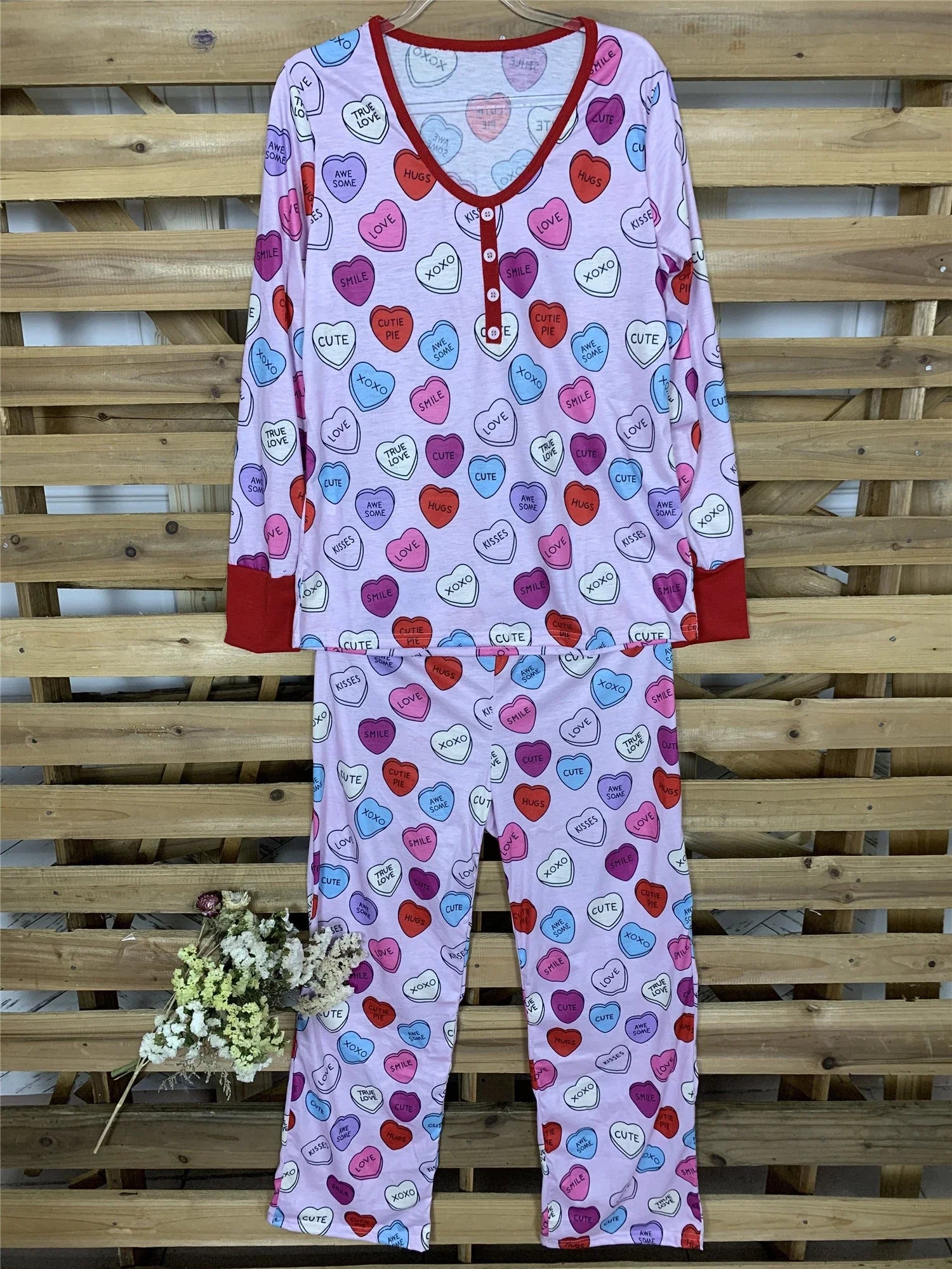 Cozy family matching Valentine's Day pajamas with heart-print design in cotton fabric