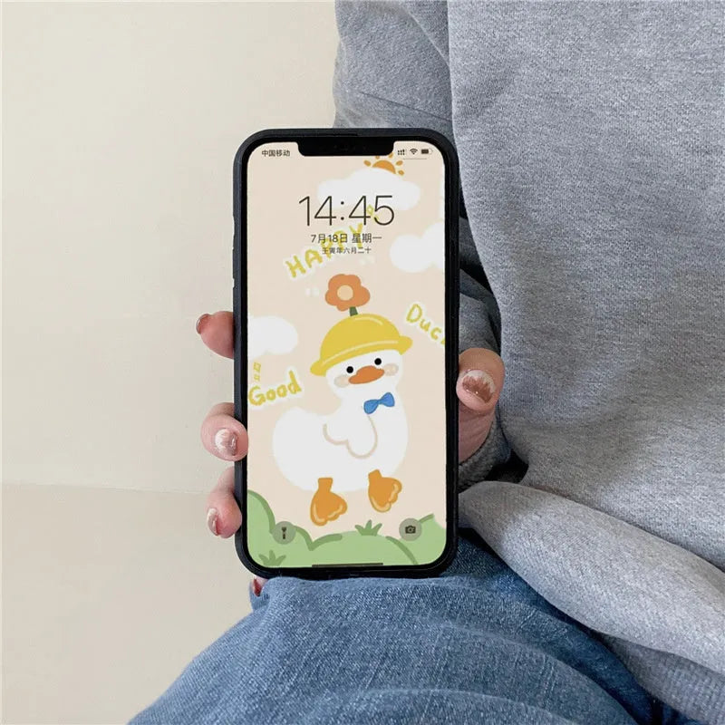 Black plush fairy character back cover case for Apple iPhone mobile phone.