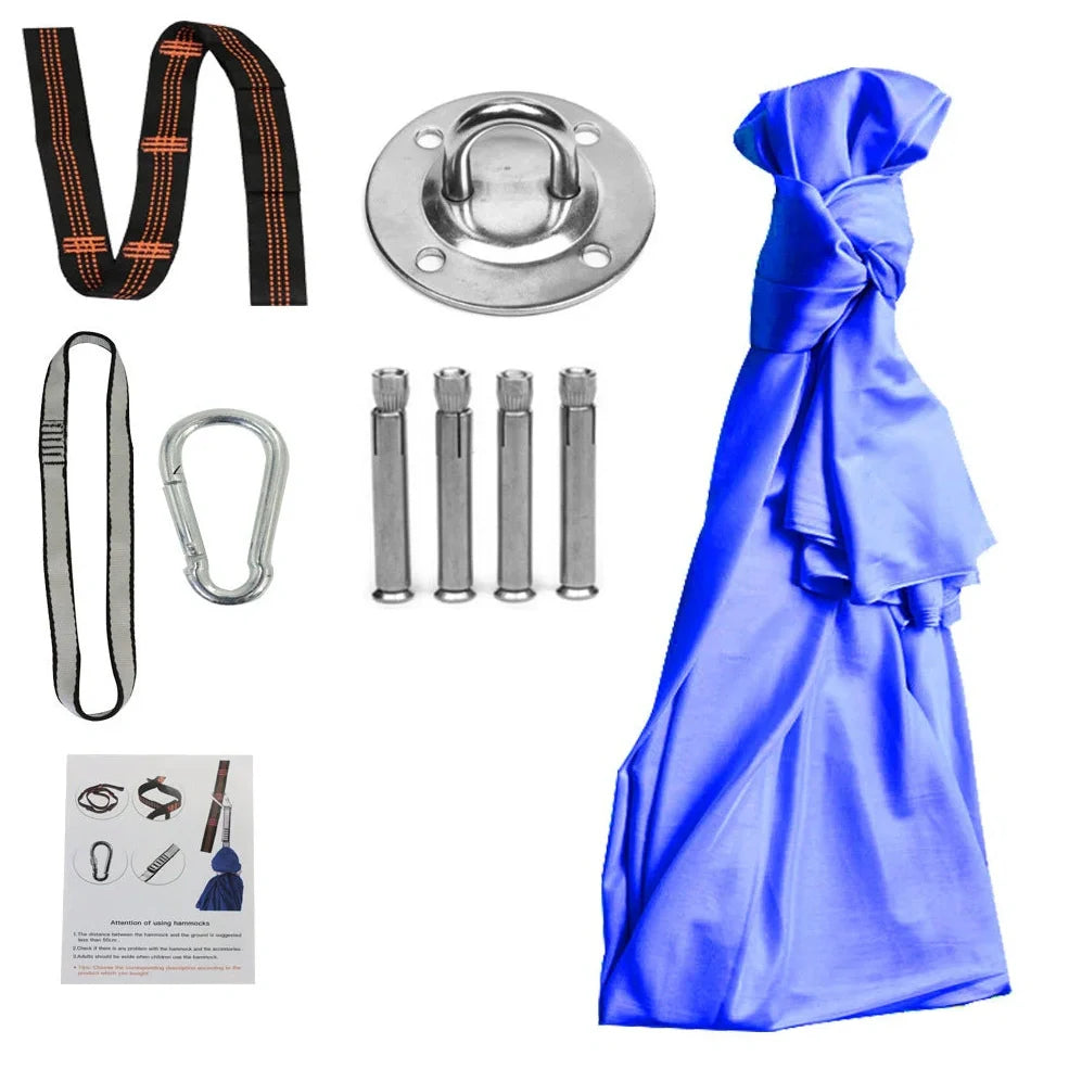 Child in black therapy swing cocoon with multi-loop daisy chain height adjustment system