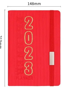 Creative student almanac diary with imitation leather cover open on a calendar page.