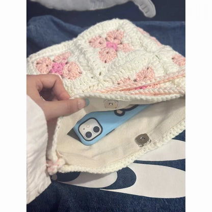 Handmade cotton crochet handbag with cherry blossom pattern and magnetic buckle closure