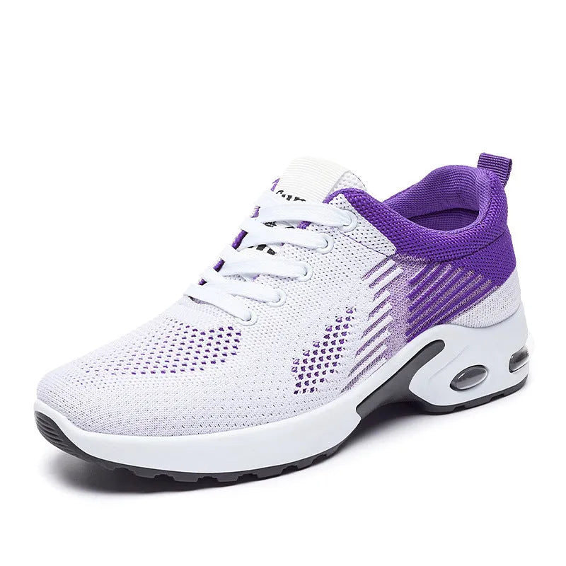 Women's striped Flyknit casual running shoes in pink, shown with a flat PVC sole and front lace-up closure.
