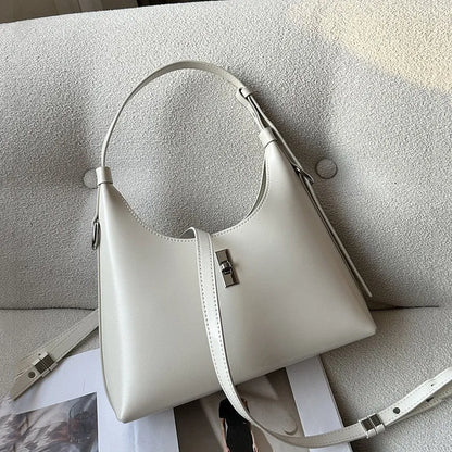 Genuine leather dumpling-shaped crossbody shoulder bag in six colour options showing sandwich pocket and internal organisation