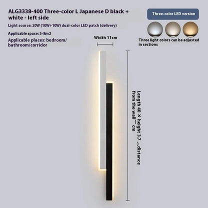 Modern strip wall lamp with acrylic shade mounted beside bed