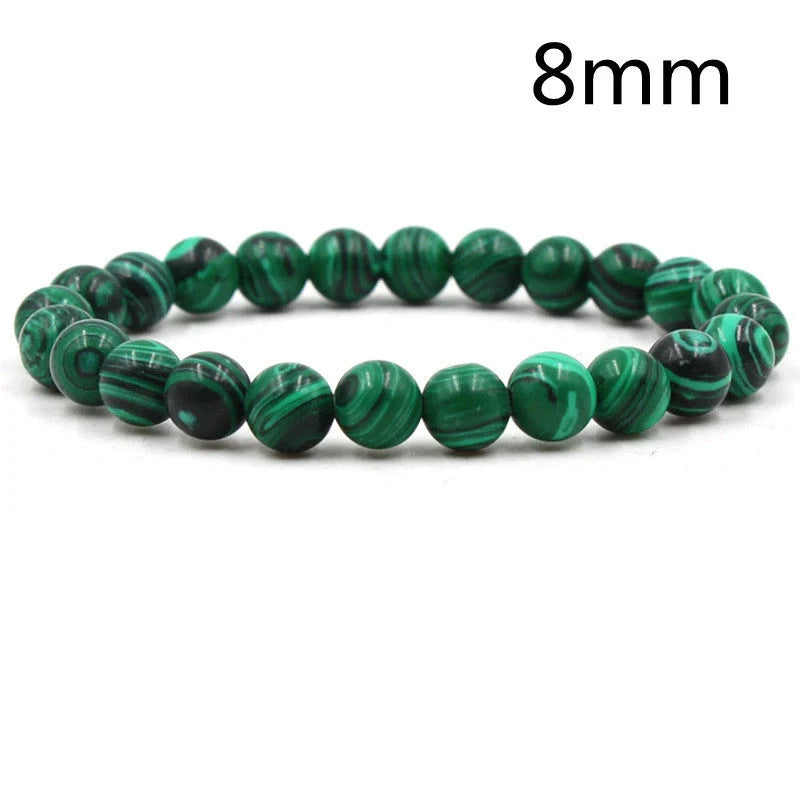 Elegant malachite stone bracelets with unique textures and patterns, perfect for a stylish accessory.