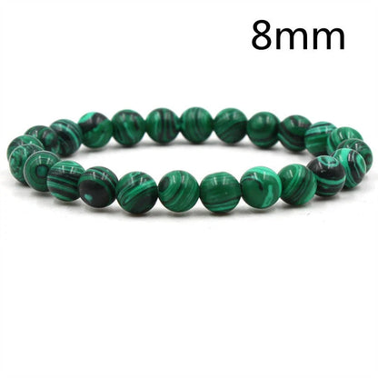 Elegant malachite stone bracelets with unique textures and patterns, perfect for a stylish accessory.