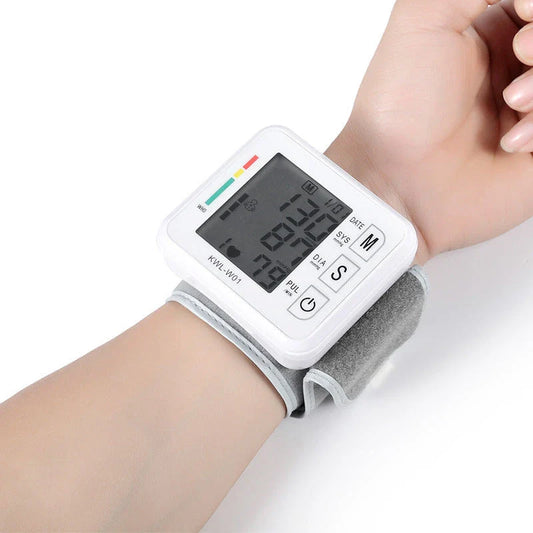 Wrist-worn digital blood pressure monitor with automatic measurement, voice playback, and advanced data tracking features