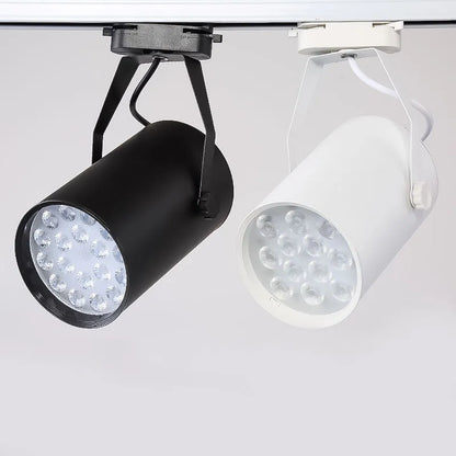 LED track spotlight with aluminium shell in black or white finish, mounted on a lighting track.