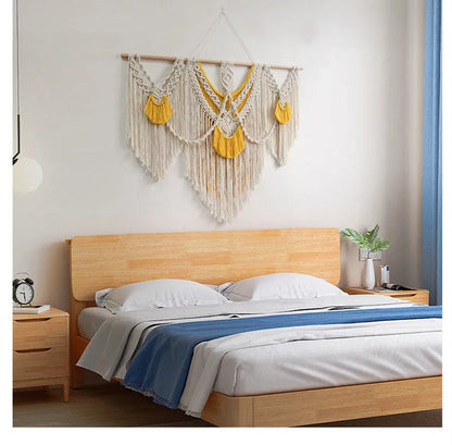 Creamy white hand-woven cotton tapestry with a rectangle shape for wall decor.