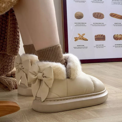 Women's winter ankle boots with non-slip sole and furry bow in white, khaki, and black
