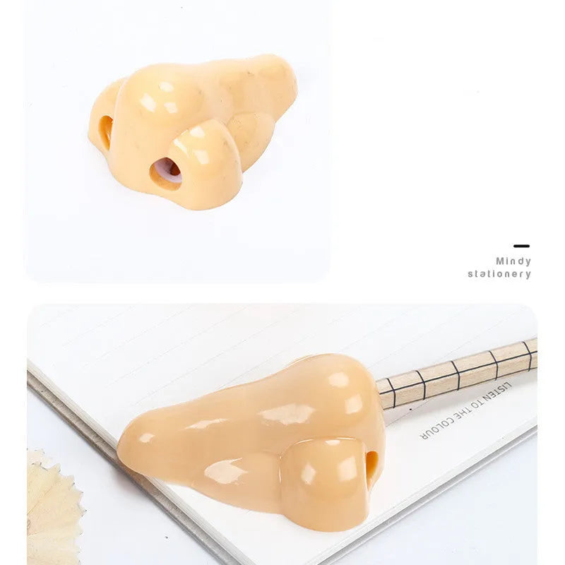 Geometry-shaped plastic pencil sharpener measuring 58x45x30mm in flesh colour