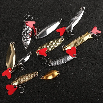 Iron pineapple fishing lure with metal sequin detailing in gold and silver colours