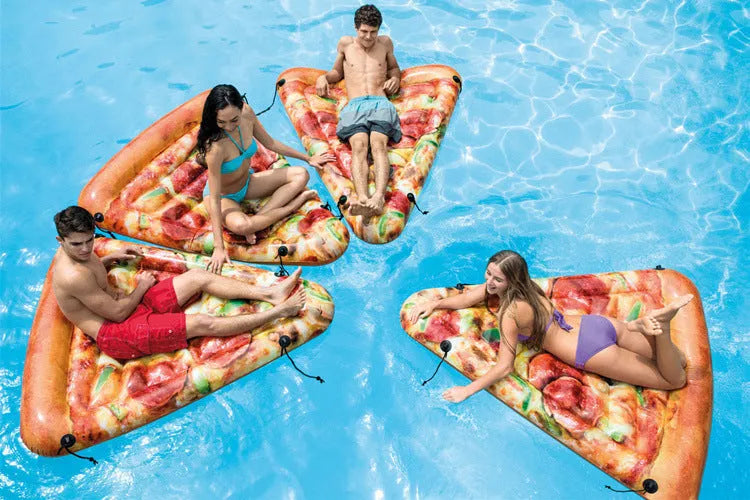 Large inflatable pizza surfboard recliner floating in a swimming pool.