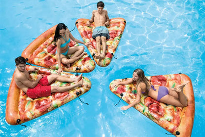 Large inflatable pizza surfboard recliner floating in a swimming pool.