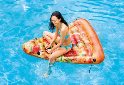Large inflatable pizza surfboard recliner floating in a swimming pool.