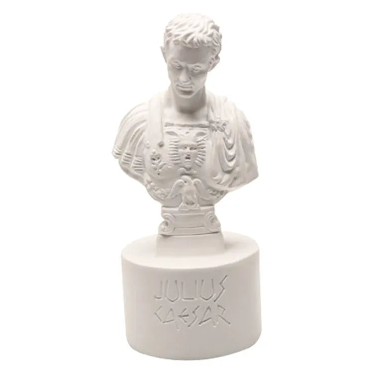 White American character modelling pen holder measuring 12cm tall on desk