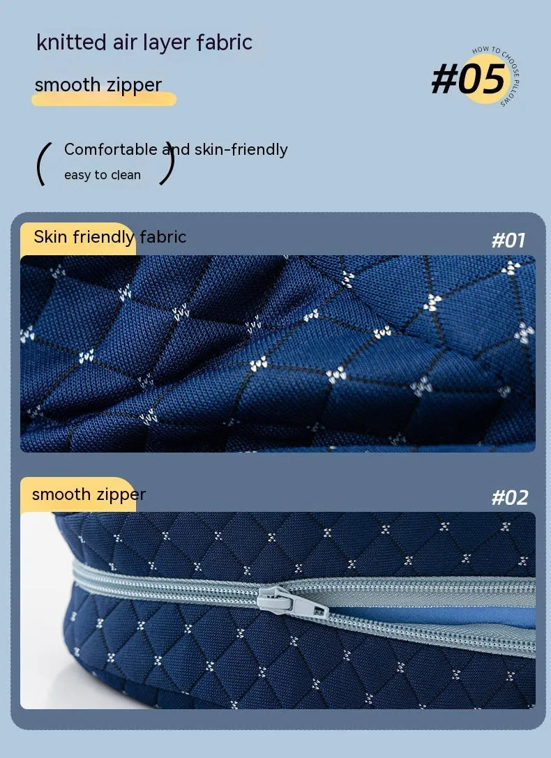 Dark blue jacquard heart-shaped memory foam leg pillow for adults on a bed.