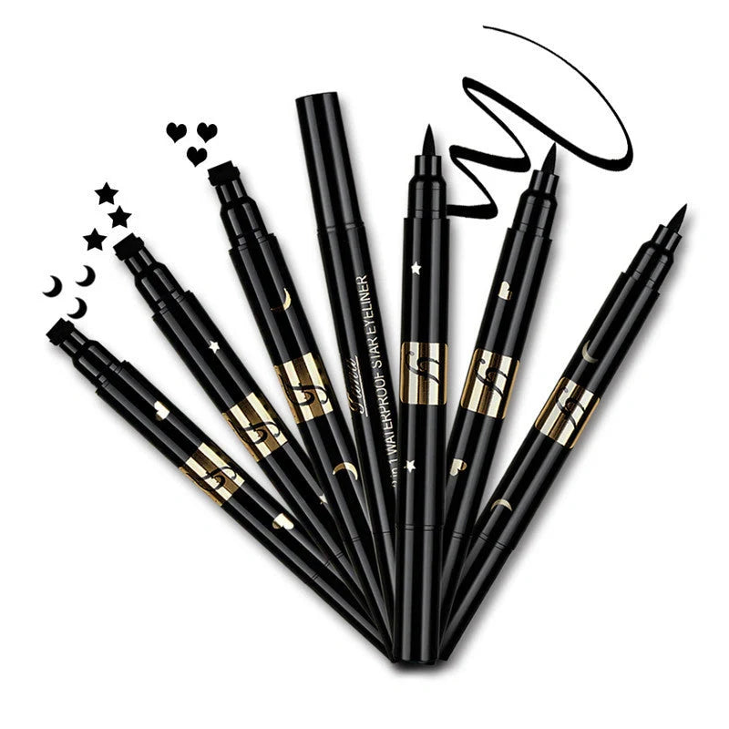 Double-headed black eyeliner with heart, moon, and pentagram stamp designs for creative makeup looks
