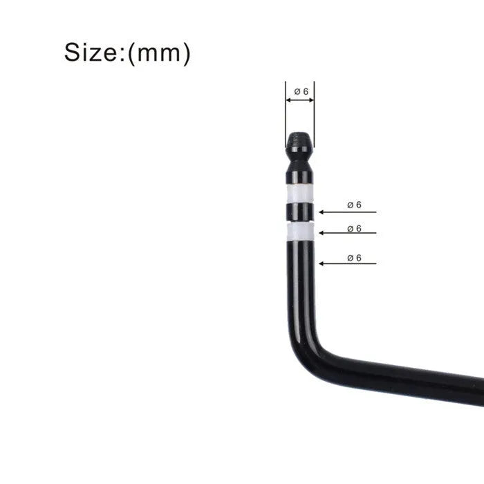 Close-up of a chrome guitar tremolo bar with direct plug-in threaded end.